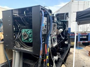 Open generator enclosure showing control wiring, cabling and radiator